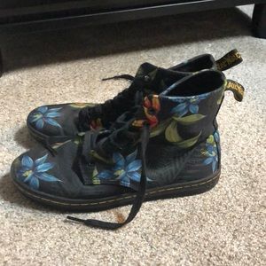 Woman’s black with flower Doc Martins